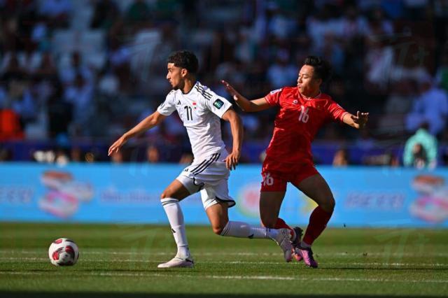 1708223420170092150.jpg 11-越南队16号阮泰山与伊拉克队11号齐达内都是国奥适龄球员.jpg
